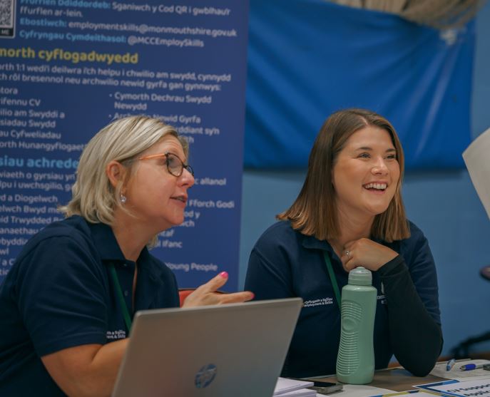 Staff interacting at the Abergavenny Jobs fair and supporting.